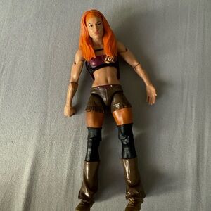 Orange and Brown Reptile Toy Figure